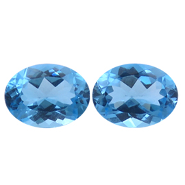 21.72 cttw Rich Blue Pair of Oval Natural Topazs