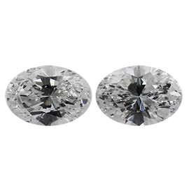 0.67 cttw Pair of Oval Natural Diamonds : E / VS1