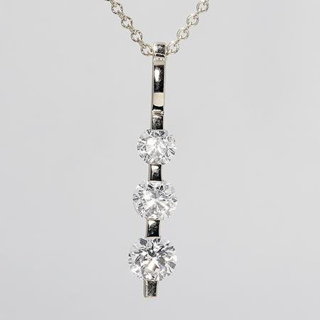 18K White Gold Three Stone Pendant : 0.75 cttw Diamonds