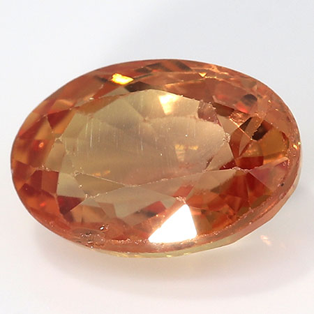 0.65 ct Oval Yellow Sapphire : Brownish Orange